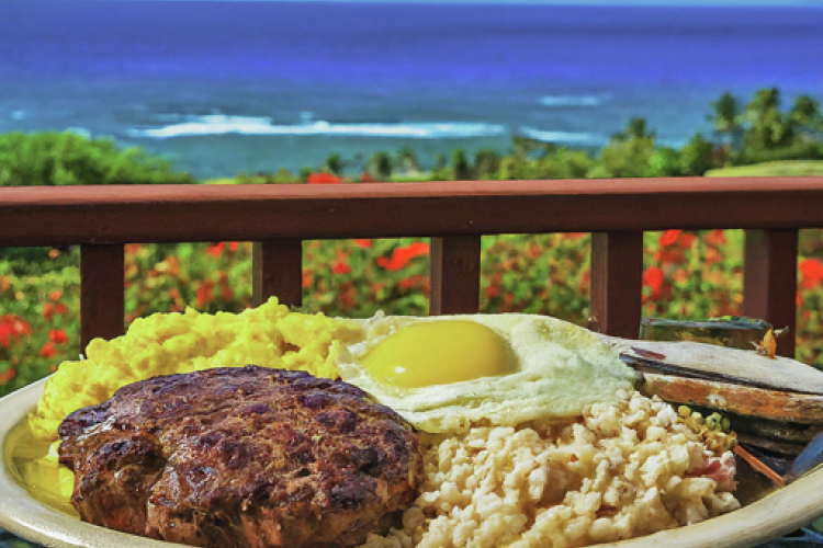 Hawaiian hamburger plate lunch overlooking Maui's coastline